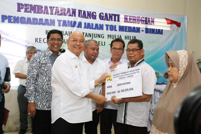 Terkena Pembangunan Jalan Tol, 52 KK Terima Ganti Rugi