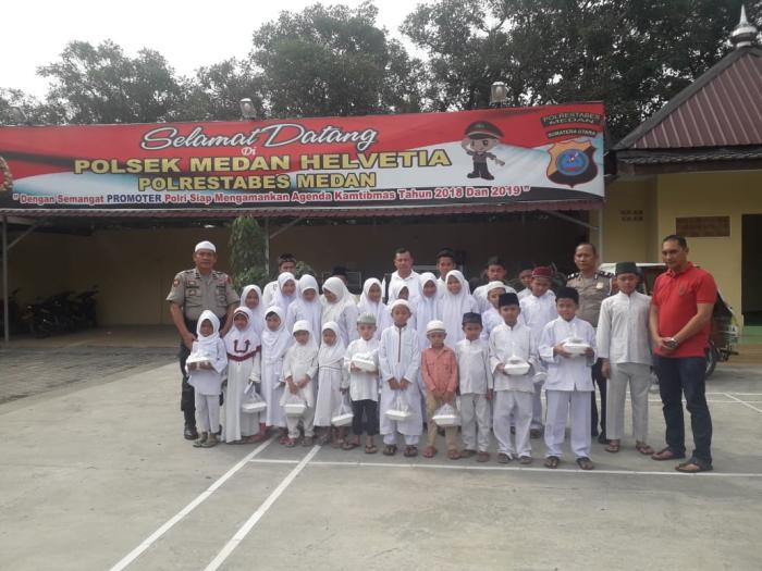 Polsek Medan Helvetia Berbagi Kepada Anak Yatim Piatu