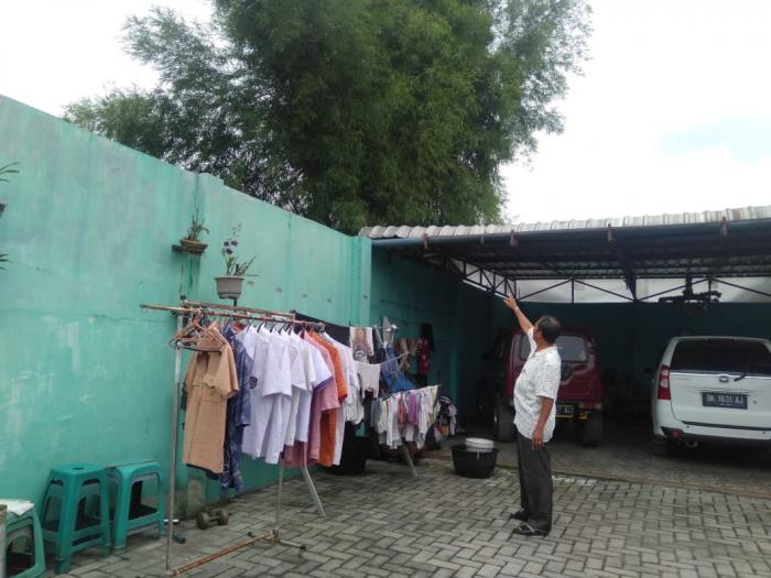 Merusak Kanopi, Simarmata Minta Tanaman Bambu Saragih Ditebang  