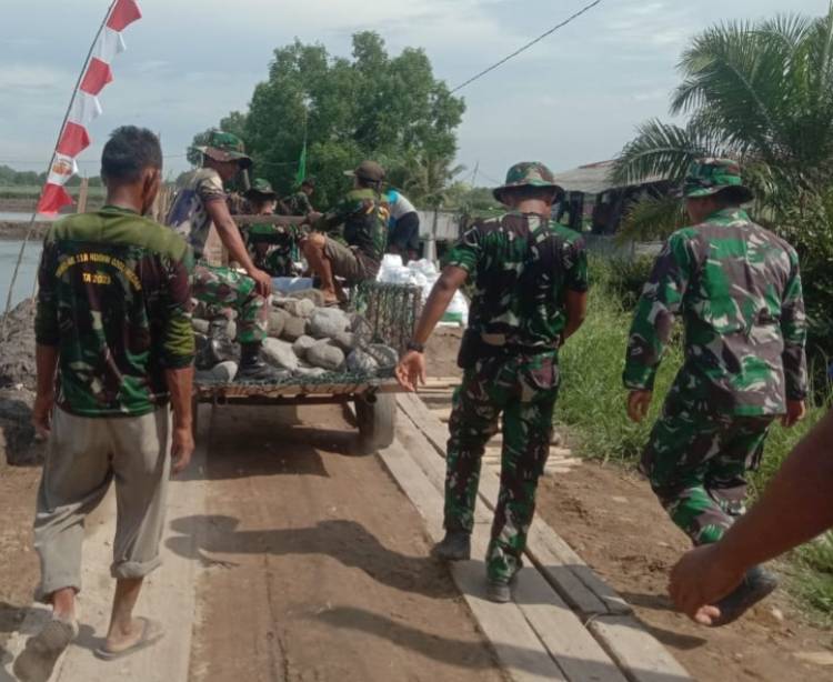 Babinsa Koramil 0201-10/MM Serda Agung Pradana monitoring TMMD Ke 118 Kodim