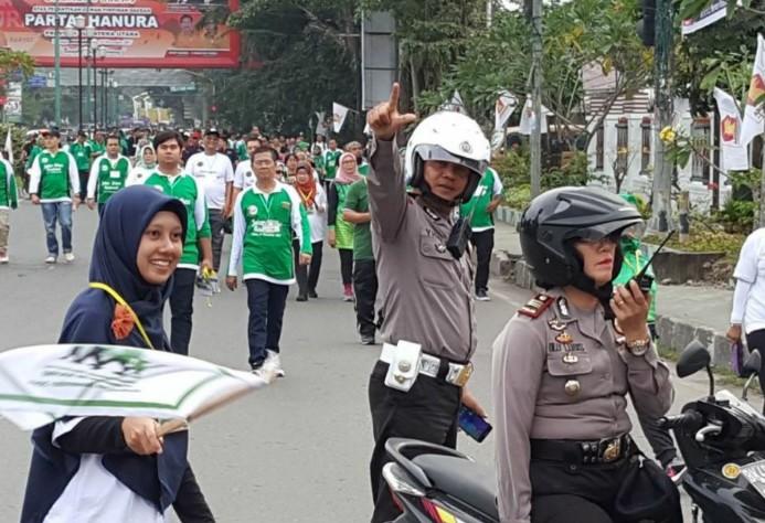 Polsek Medan Kota Kawal Jalan Santai Penutupan Munas Kahmi